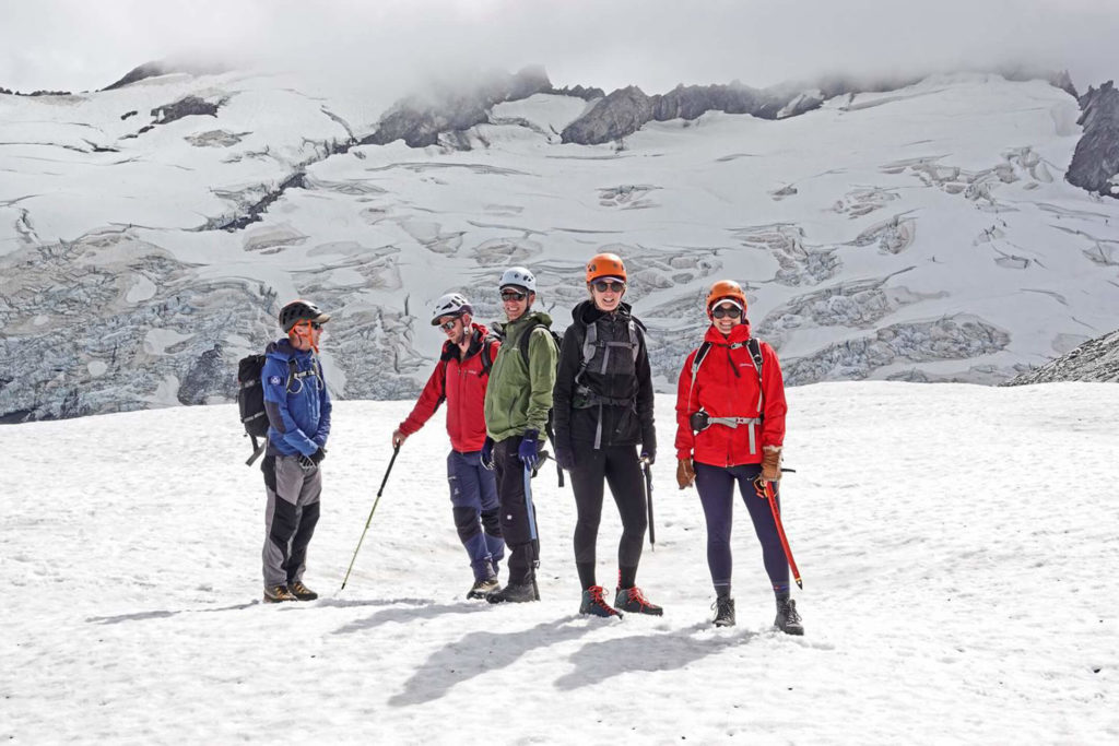 Group of 5 standing on Tyndall Glacier